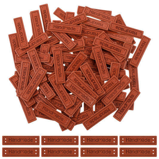 AOZUO 100pcs Handmade PU Leather Tags, Embossed Crochet Tags with Holes Handmade Sew on Knitting Labels Embellishment Knit Accessories for DIY Sweaters Scarves Bags Gloves Hats